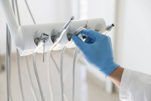 Professional Tooth Extraction technician working in Wilmington, NC